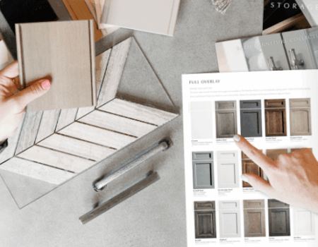 homeowners reviewing cabinet color samples