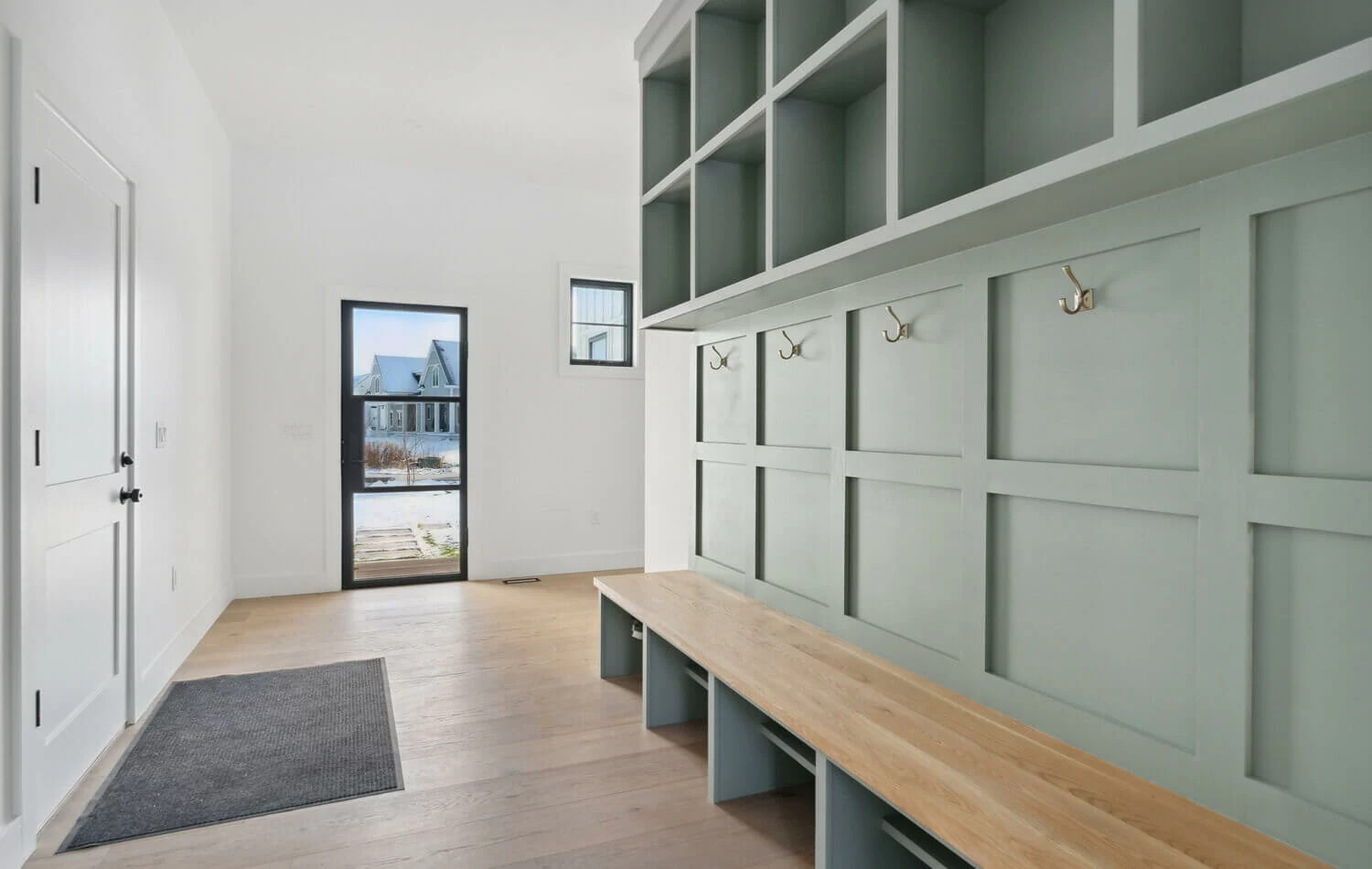 DropZone in modern farm house with wood bootbench