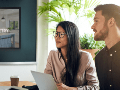 couple in a meeting discussion cabinetry prices ranges