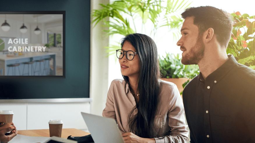 couple in a meeting discussion cabinetry prices ranges